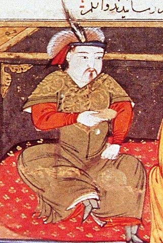 A 14th-century illustration of Hulagu Khan by Persian historian Rashid al-Din. Hulagu sits on a red carpet in royal clothes and a feathered cap.