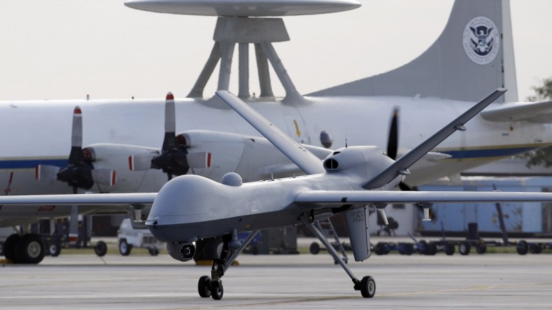This Nov. 8, 2011 file photo shows a Predator B unmanned aircraft taxis at the Naval Air Station in Corpus Christi, Texas. (AP Photo/Eric Gay, File)