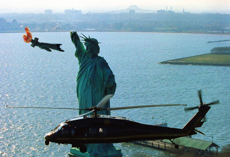 "Liberty In Ruins" -- an image of a helicopter flying past the ruins of the Statue of Liberty. (Jakob Reimann)