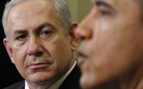 Israeli Prime Minister Benjamin Netanyahu listens as President Barack Obama speaks during their meeting, Monday, March, 5, 2012, in the Oval Office of the White House in Washington. (AP Photo/Pablo Martinez Monsivais)