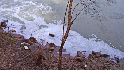 A discharge point from the Alanta R.M. Clayton Water Reclamation (sewage) facility in Atlanta, Georgia, off of the Chattahoochee trailway, with pieces of trash along the trailin this January 2006 photo. (Photo/Bearden via Flickr)