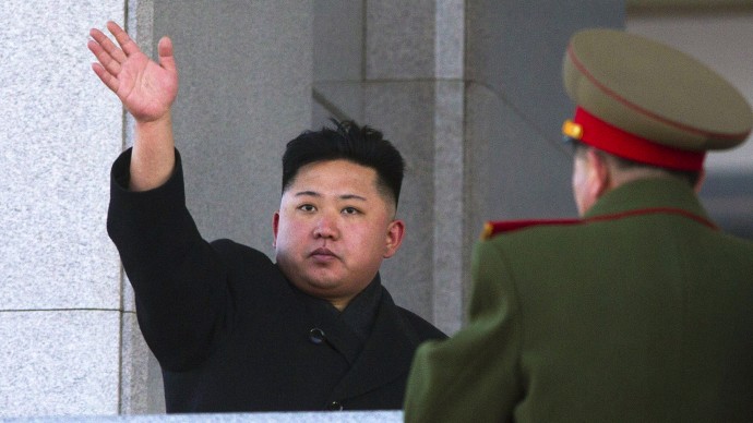 New North Korean leader Kim Jong Un waves at Kumsusan Memorial Palace in Pyongyang after reviewing a parade of thousands of soldiers and commemorating the 70th birthday of his late father Kim Jong Il on Thursday, Feb. 16, 2012. (AP Photo/David Guttenfelder)