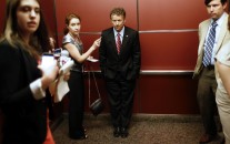 Sen. Rand Paul, R-Ky. rides in an elevator with reporters and staff members after he spoke at the Faith and Freedom Coalition Road to Majority Conference in Washington, Thursday, June 13, 2013. (AP/Charles Dharapak)