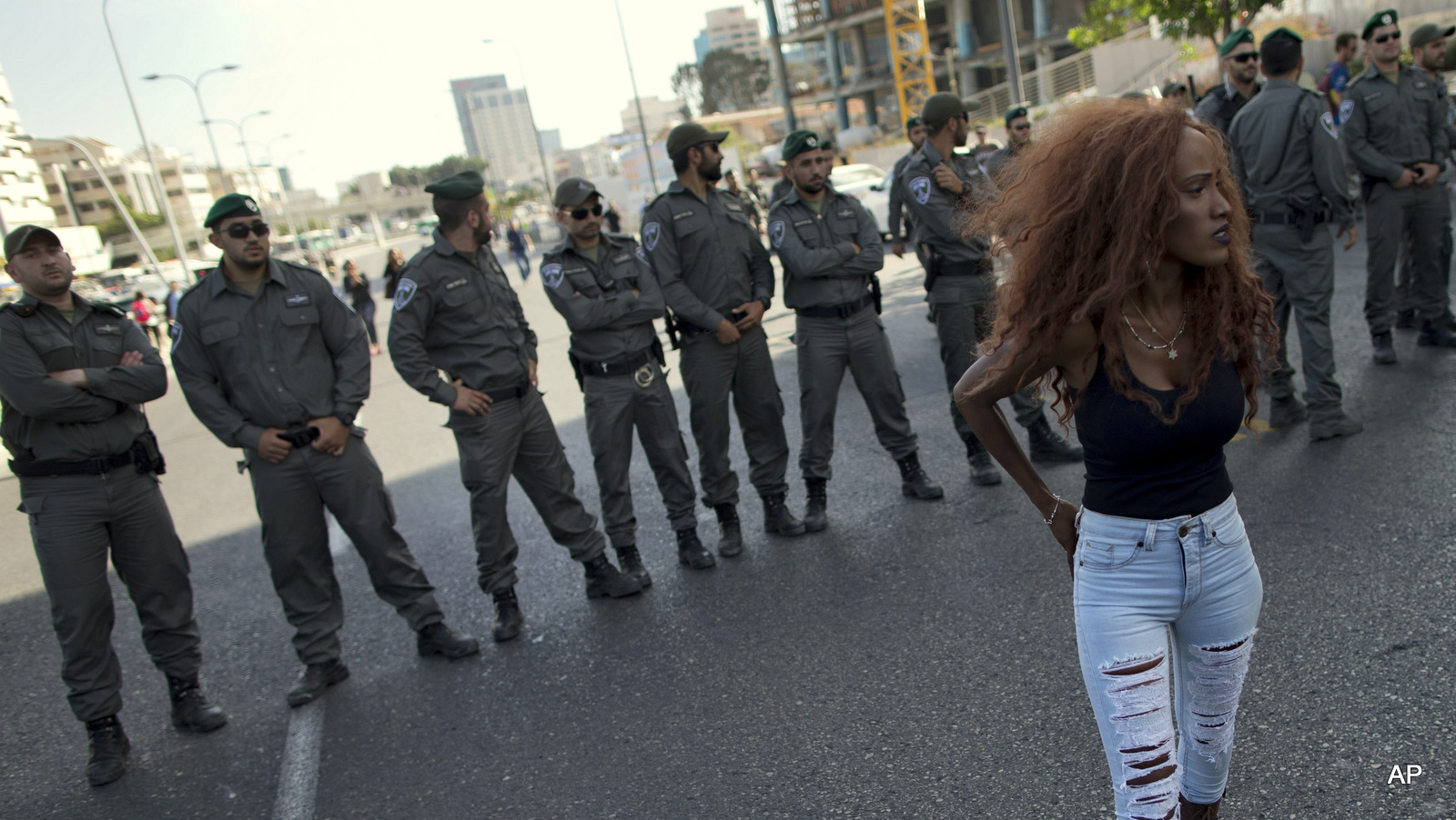 Israel's Jewish Ethiopians block highway during a protest against racism and police brutality in Tel Aviv, Israel, Sunday, May 3, 2015. Several thousand people, mostly from Israel's Jewish Ethiopian minority, protested in Tel Aviv against racism and police brutality on Sunday shutting down a major highway and scuffling with police.