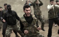 Syrian rebels attend a training session in Maaret Ikhwan near Idlib, Syria.