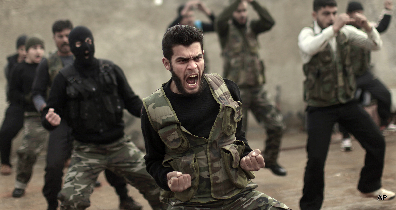Syrian rebels attend a training session in Maaret Ikhwan near Idlib, Syria.