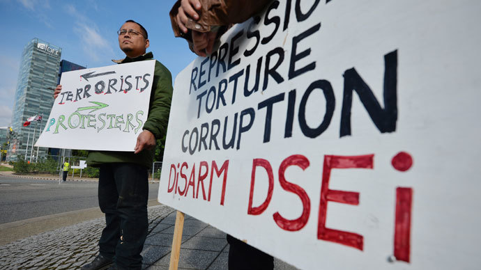 Protester's gather outside of the 2013 Defence Security and Equipment International (DSEi) exhibition held at ExCel in London. 