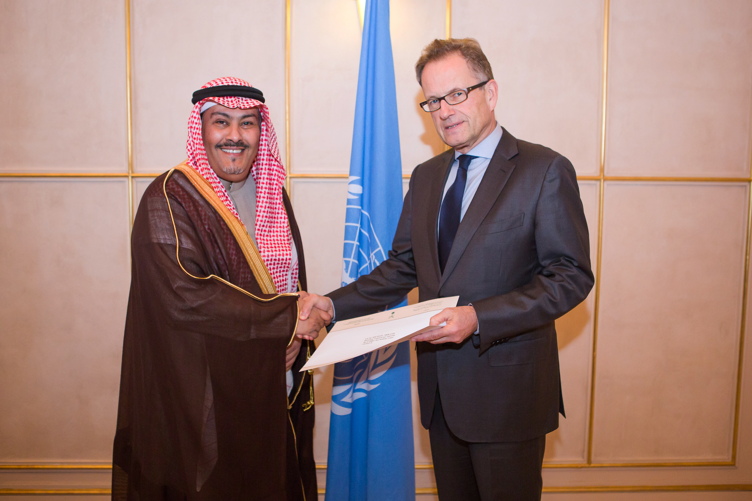 Faisal bin Hassan Trad, the Kingdom of Saudi Arabia (left), presents his credentials to the Acting Director-General of the United Nations Office, Michael Møller( right) at Geneva. January 7th, 2014. Photo by Pierre Albouy