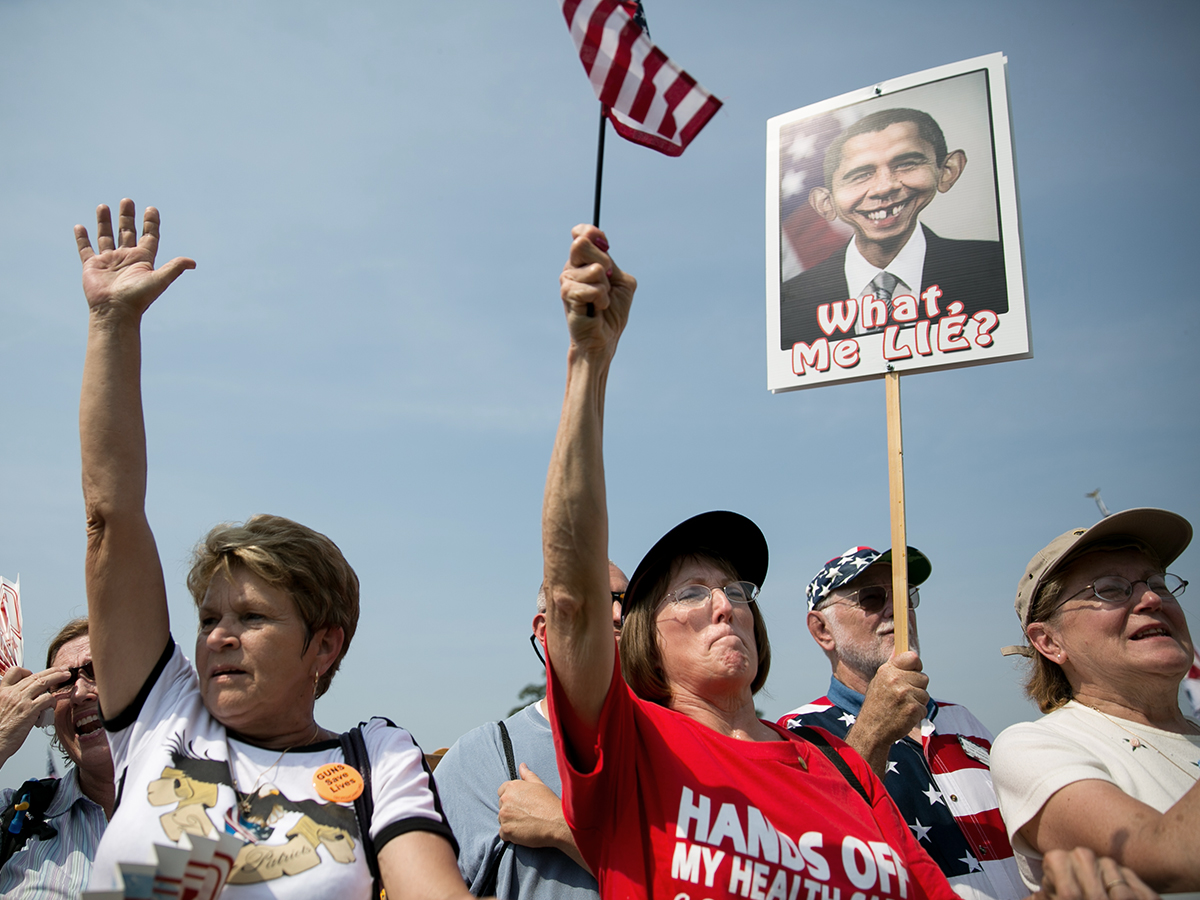 Tea Party activists cheer during the "Exempt America from Obamacare" rally, on Capitol Hill, September 10, 2013 in Washington, DC. (Photo by Drew Angerer/Getty Images)