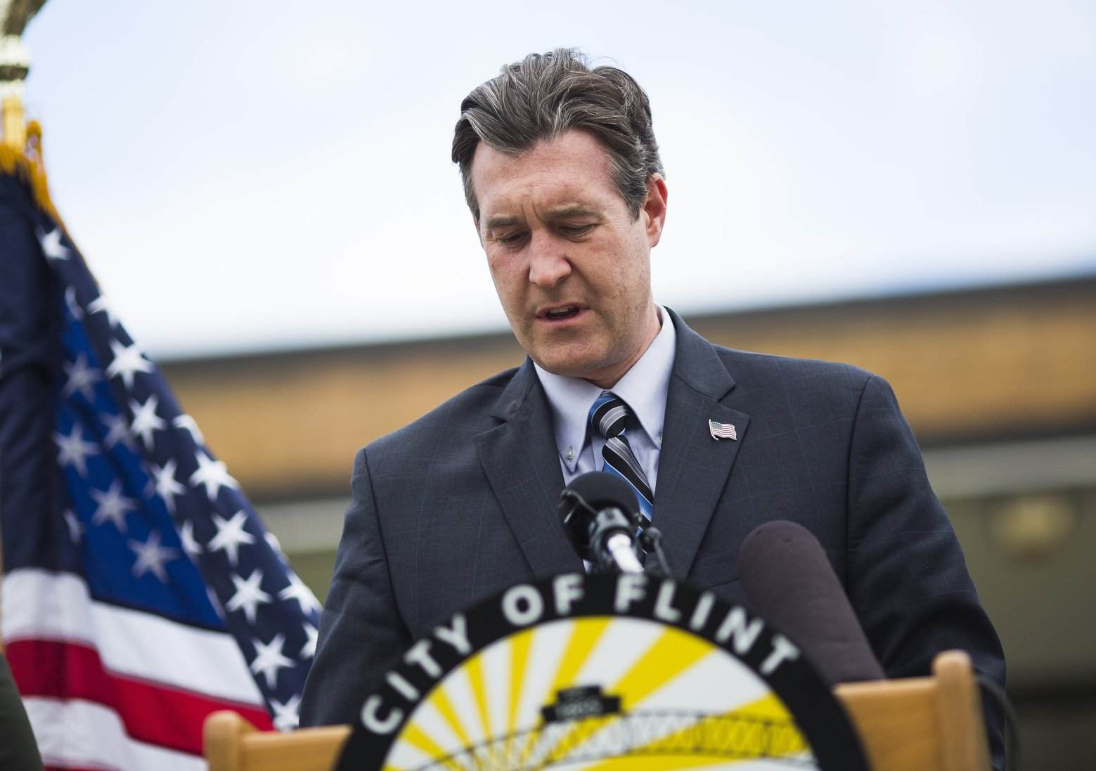 Flint Mayor Dayne Walling speaks during a news conference, Friday, Oct. 16, 2015, outside Ralph M. Freeman Elementary School in Flint, Mich. (Danny Miller/The Flint Journal-MLive.com via AP
