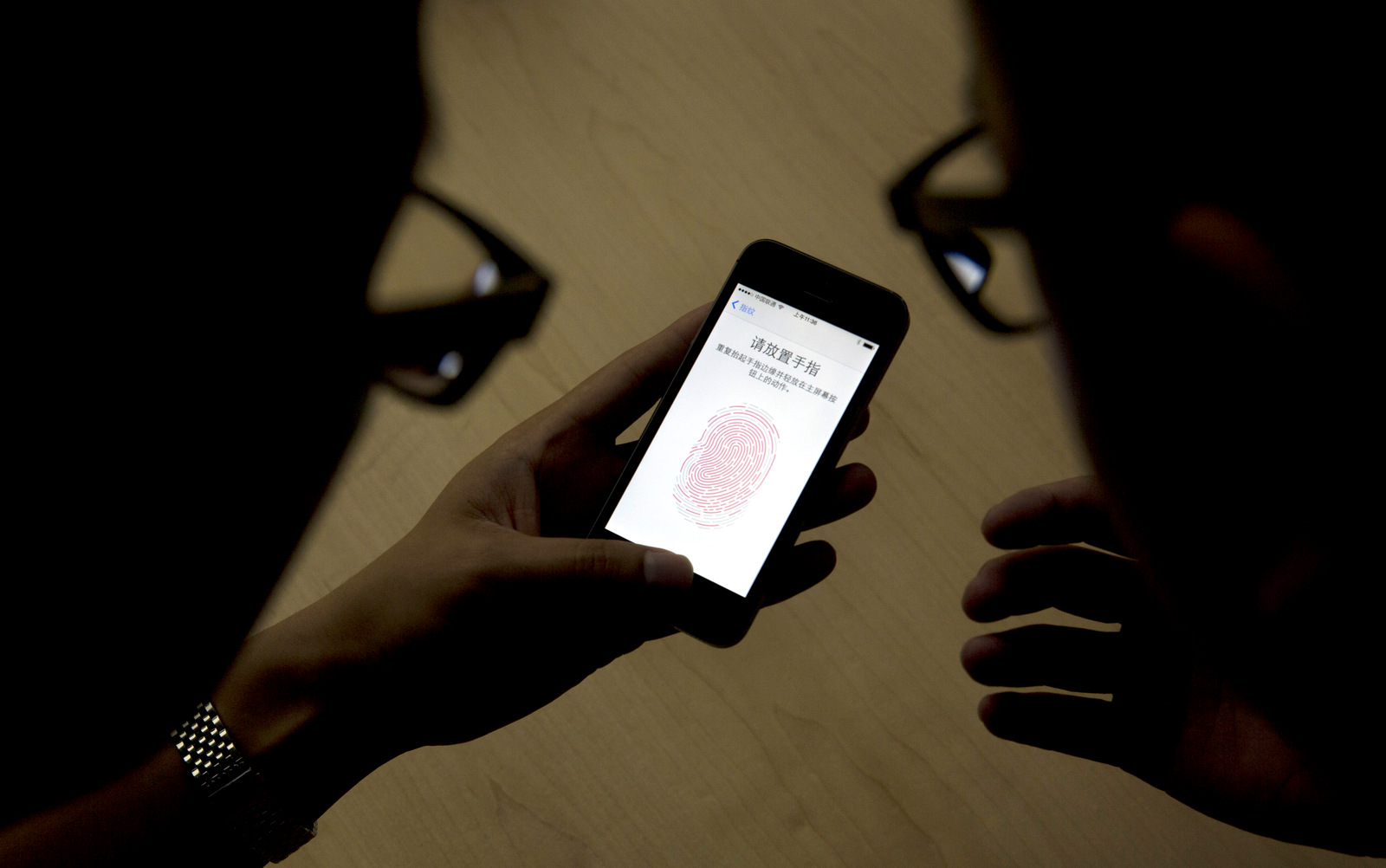 The intensifying legal battle over encryption between Apple and the Justice Department has all but obscured another more subtle division, the one inside the Obama administration itself. (AP Photo/Ng Han Guan, File)