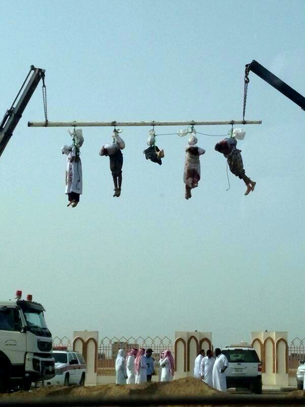 The 'crucifixion' of 5 beheaded bodies in Saudi Arabia.