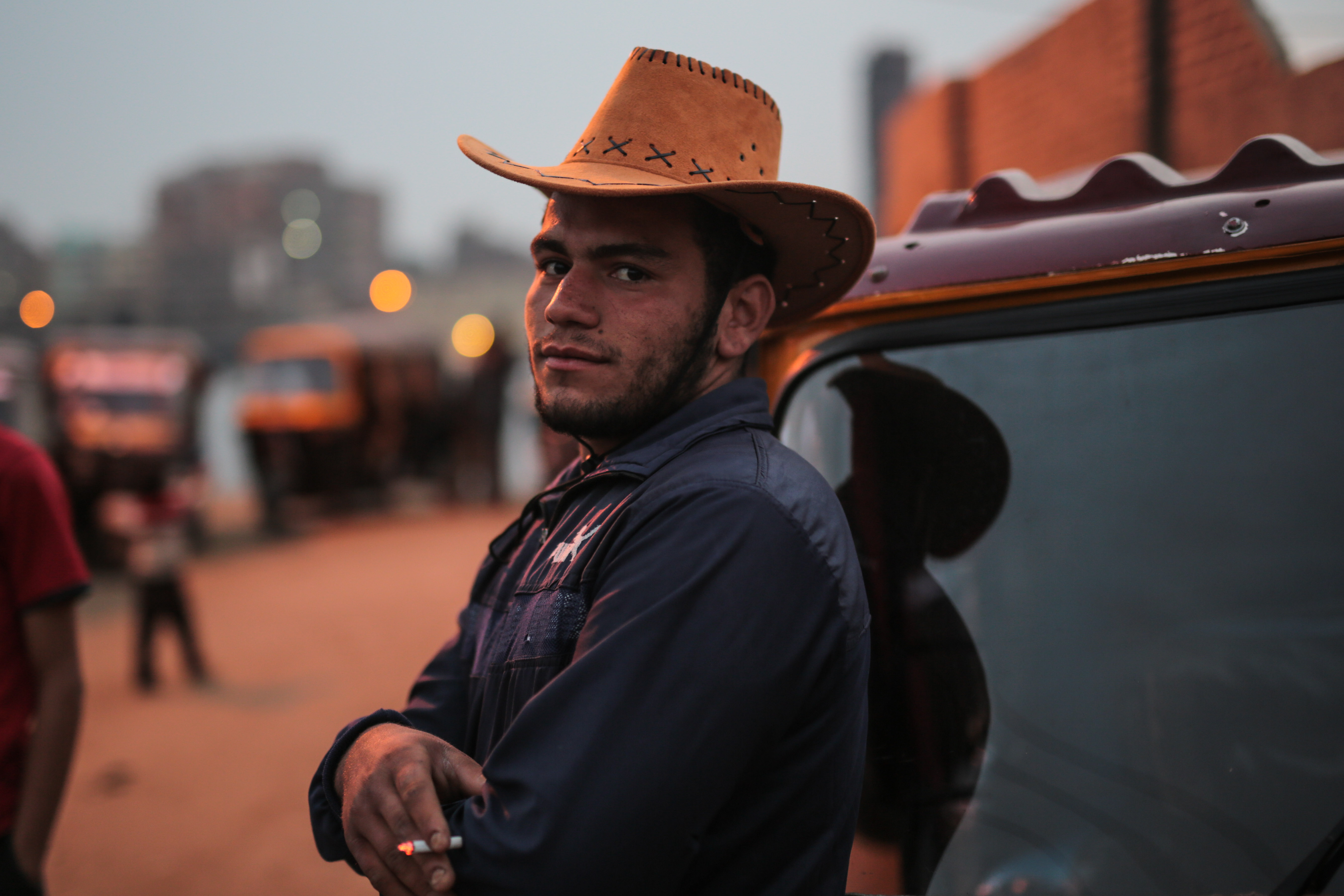 A tuk-tuk driver waits for customers in Geziret Al-Warraq, an impoverished island that can only be reached by ferry, in Cairo, Egypt, Tuesday, March 10, 2015. (AP Photo/Mosa'ab Elshamy)