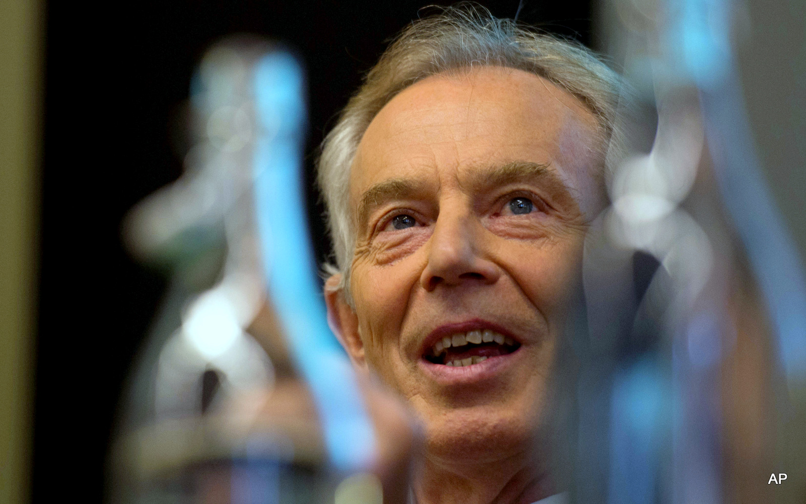 Former British Prime Minister Tony Blair takes part in a discussion on Britain in the World, in London, Tuesday May 24, 2016, where he acknowledged the invading nations had underestimated the "forces of destabilization" that would emerge in Iraq after the toppling of dictator Saddam Hussein. Blair said Tuesday that the Islamic State group forces will be defeated only with a ground war involving Western troops.