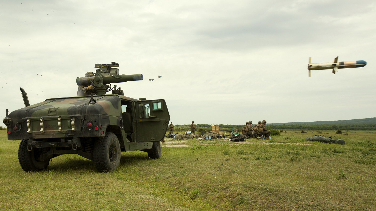 U.S. Marine Corps Cpl. Tyler Mayberry fires a tube-launched, optically-tracked, wire-guided missile downrange while conducting live-fire training during exercise Platinum Eaglevat Babadag Training Area, Romania. (U.S. Marine Corps photo by Lance Cpl. Samantha A. Barajas)