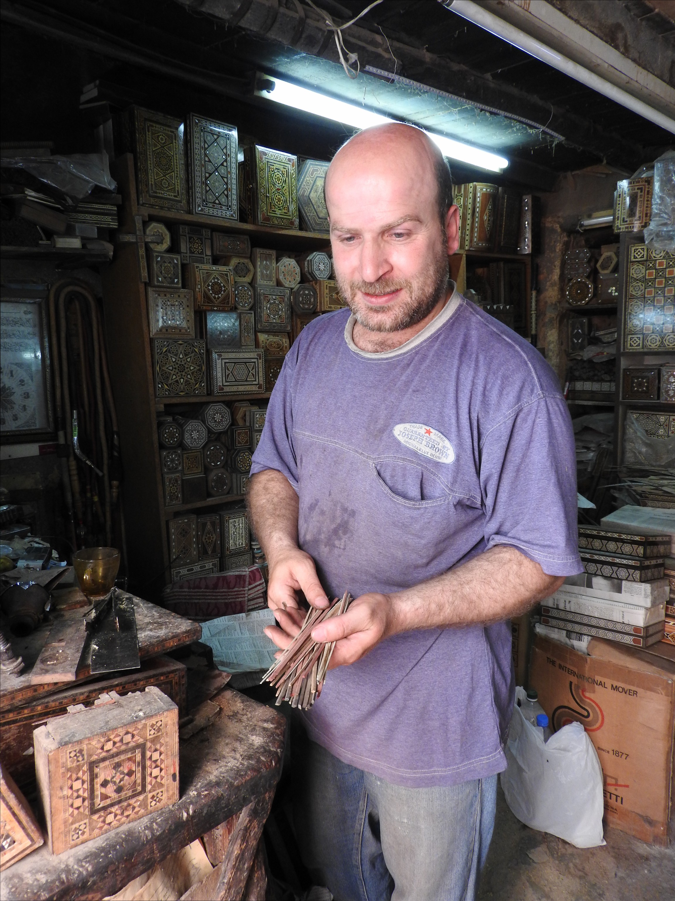 In the narrow lanes of Old Damascus, a wooden mosaic artisan explains the techniques of his trade. The tediously-crafted and beautiful woodwork is a favourite for tourists. In spite of the dearth of customers in the past five and a half years, craftsmen and women continue to practise their skills in hopes that when peace returns to Syria, so too will tourists.