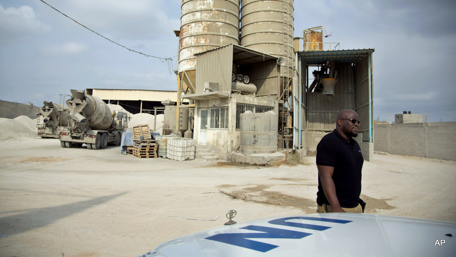 Keith Mathias-O'Chez, an inspector of building materials for the U.N. Relief and Works Agency, visits one of seven mixing concrete factories that are responsible for preparing the concrete for the U.N. projects in the Gaza Strip. 