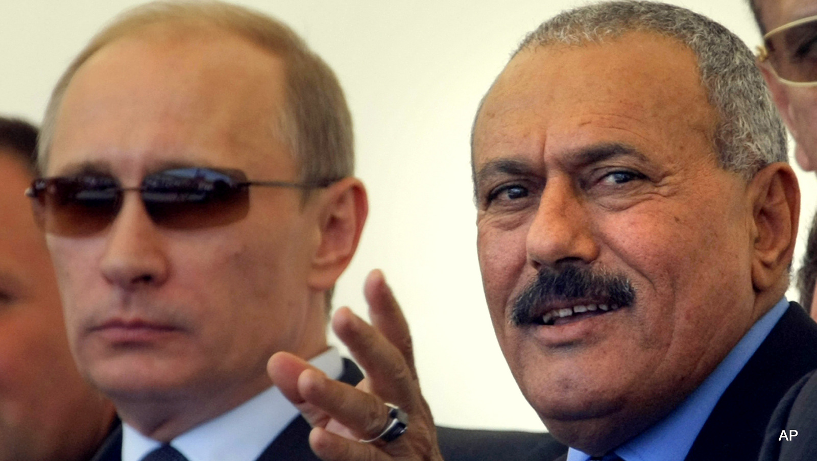 Russian Prime Minister Vladimir Putin, left, and Yemen's President Ali Abdullah Saleh watch a military show as they attend the international forum "Technologies in machine building 2010" in Zhukovsky outside Moscow, Wednesday, June 30, 2010.