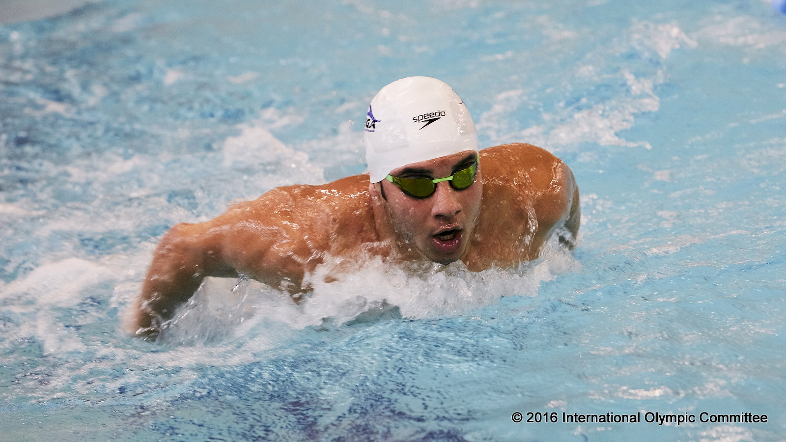 25 year-old Rami Anis is Syria’s fastest swimmer in the 100m butterfly and now resides in a small town close to the Belgian city of Ghent.