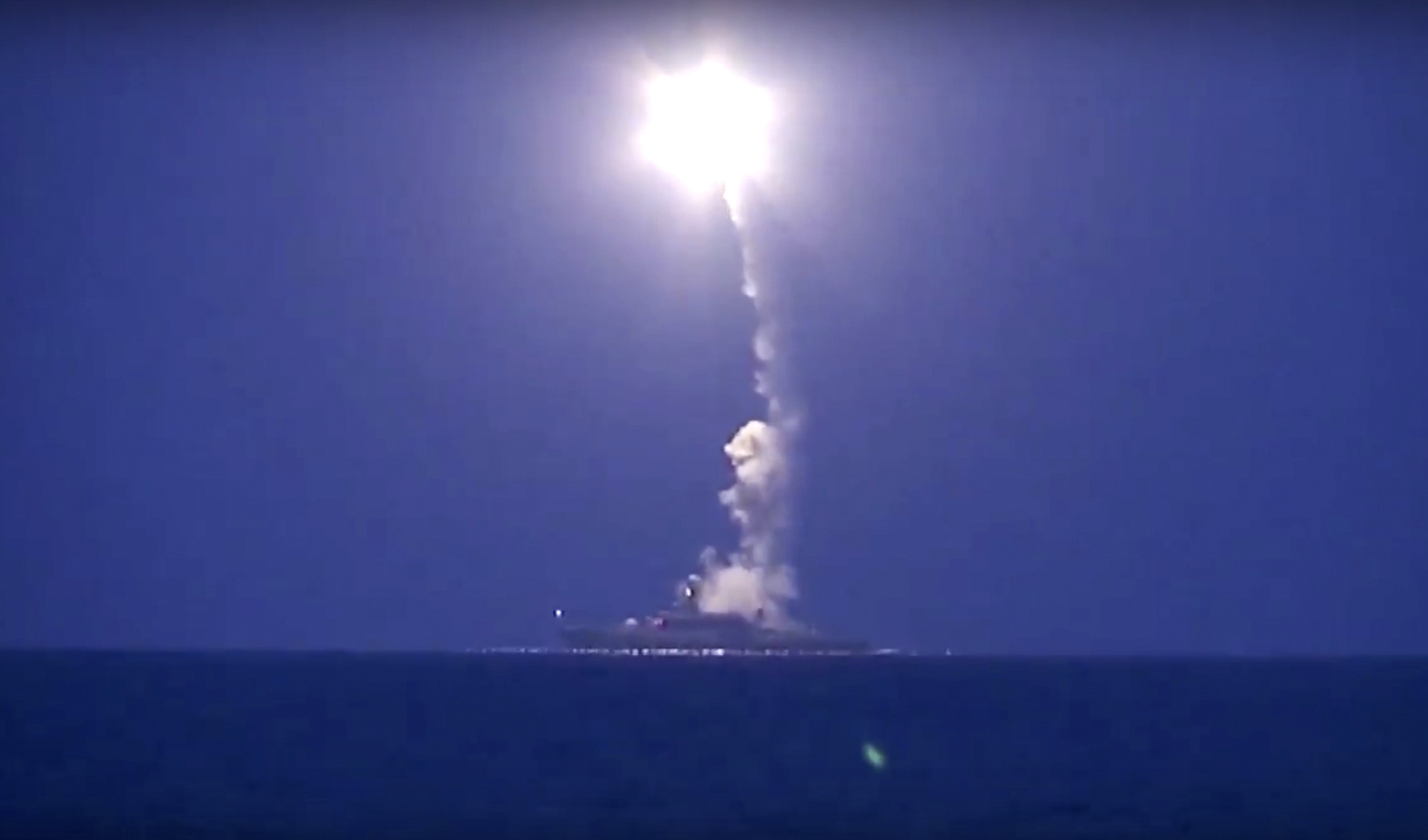 Russian navy ship launches a cruise missile in the Caspian Sea. (Russian Defense Ministry Press Service via AP)
