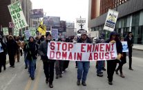 Dakota Access pipeline protesters march from the Polk County Courthouse to a public meeting space to hold a rally Dec. 15, 2016 in Des Moines, Iowa. The protests came after a judge heard arguments in a lawsuit filed by several Iowa landowners who challenge forceful taking of their land for the pipeline and challenge the state's permit process. (AP Photo/David Pitt)