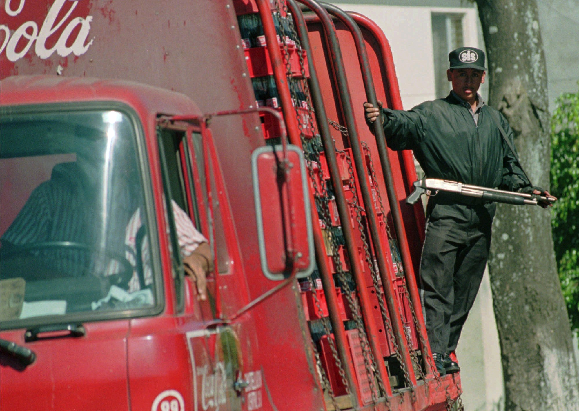 Coca-Cola has been linked to paramilitary groups and human rights abuses in Colombia. The company has faced multiple lawsuits over attacks on union organizers. (AP Photo/Scott Sady)