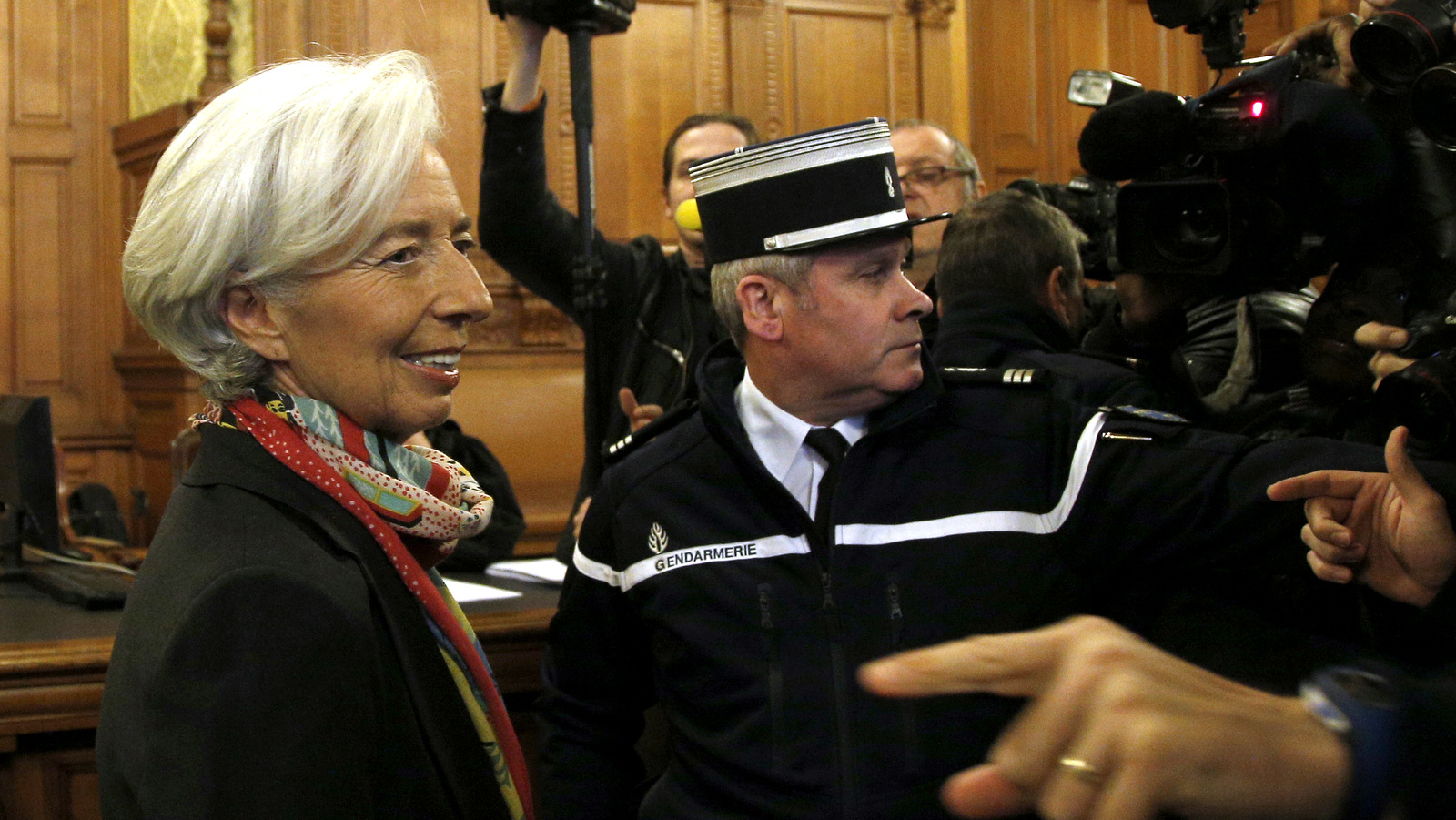 International Monetary Fund chief Christine Lagarde, right, arrives at the special Paris court, France. (AP/Thibault Camus)