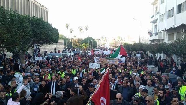 Tunisians demonstrating in Sfax on 24 December over the killing of Mohamed Zouari who was gunned dunned earlier this month near his home (Nadim Bouamoud/MEE)