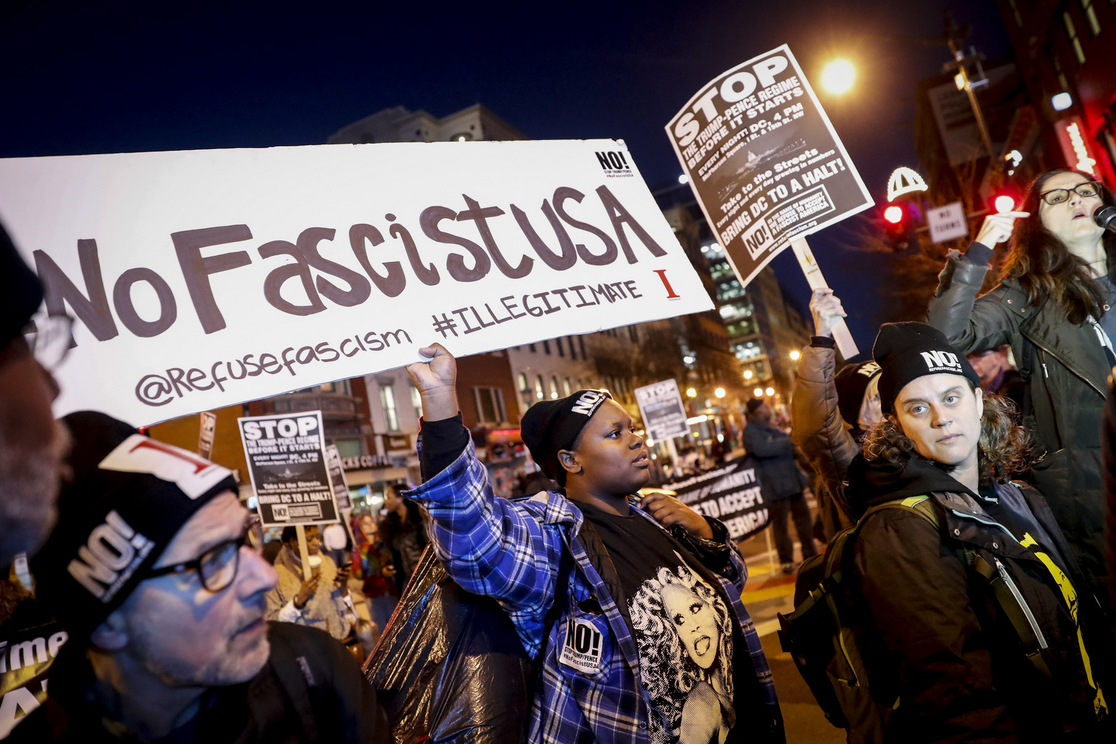 Protestors gather for a march on the Capitol Building as preparations continue ahead of the presidential inauguration, Wednesday, Jan. 18, 2017, in Washington. (AP Photo/John Minchillo)