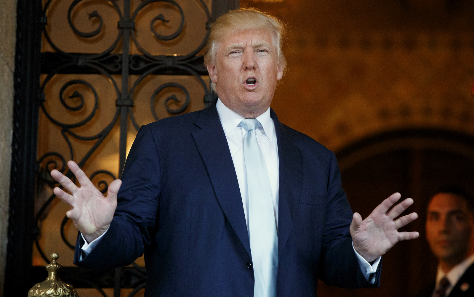 Donald Trump speaks to reporters at Mar-a-Lago in Palm Beach, Fla. Trump challenges U.S. intelligence agencies to provide decisive evidence of Russian involvement in election-season hacking. (AP/Evan Vucci)