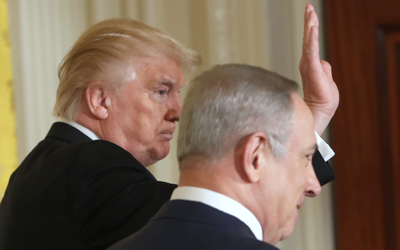 President Donald Trump waves as he and Israeli Prime Minister Benjamin Netanyahu leave their joint news conference in the East Room of the White House in Washington, Wednesday, Feb. 15, 2017. (AP/Pablo Martinez Monsivais)