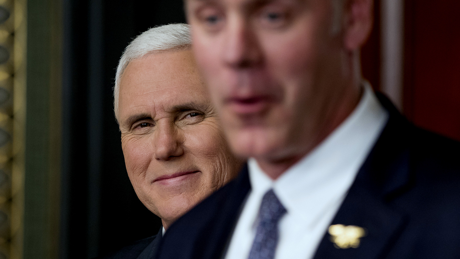 Vice President Mike Pence, left, smiles as newly sworn in Interior Secretary Ryan Zinke speaks, March 1, 2017, in White House. (AP/Andrew Harnik)