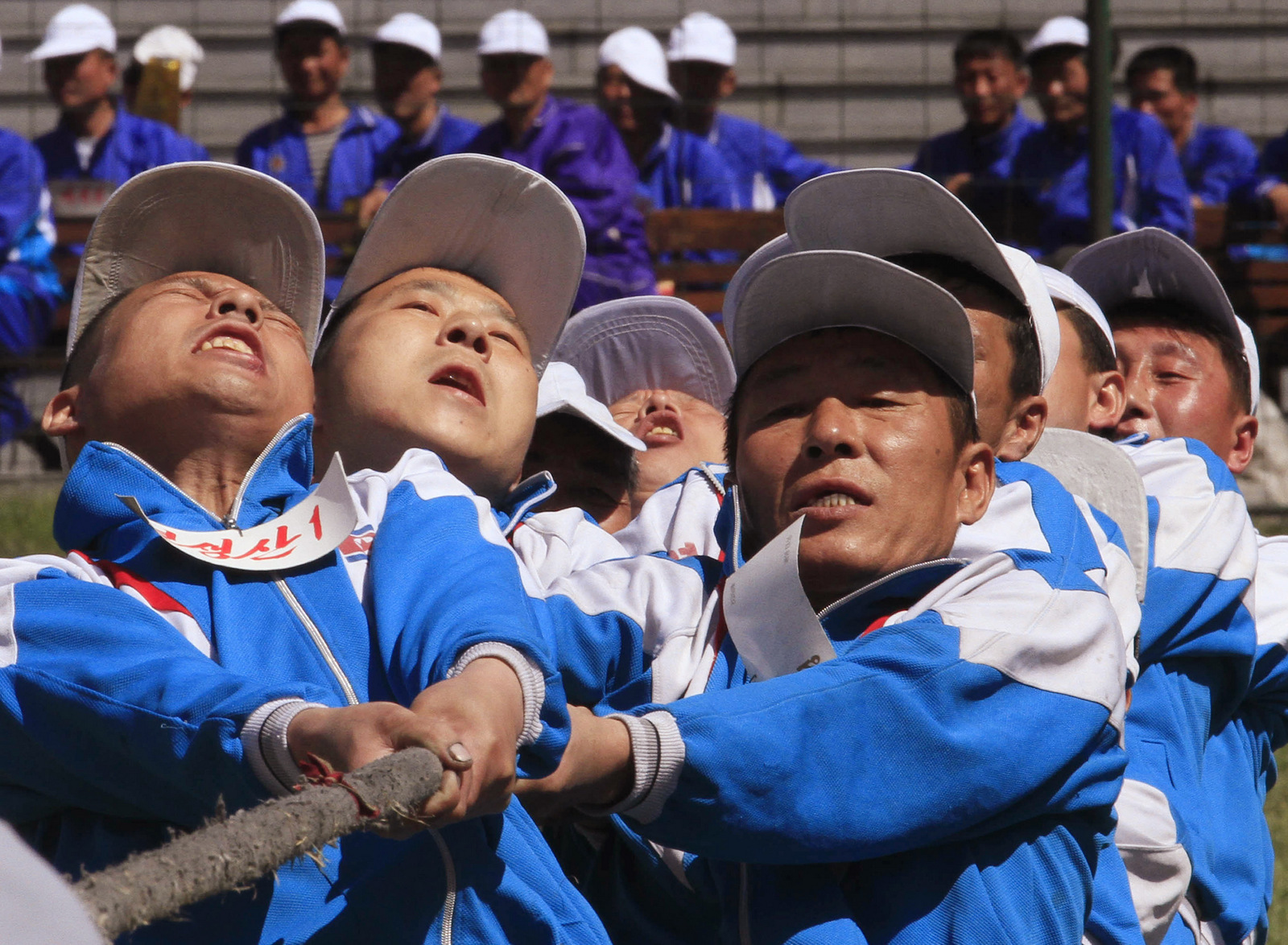 North Korean workers take part in a tug of war as they celebrate May Day at the Pyongyang Thermal Power Complex in Pyongyang, North Korea, Monday, May 1, 2017. International Workers' Day, which is also known as Labor Day in some countries, is being celebrated worldwide.