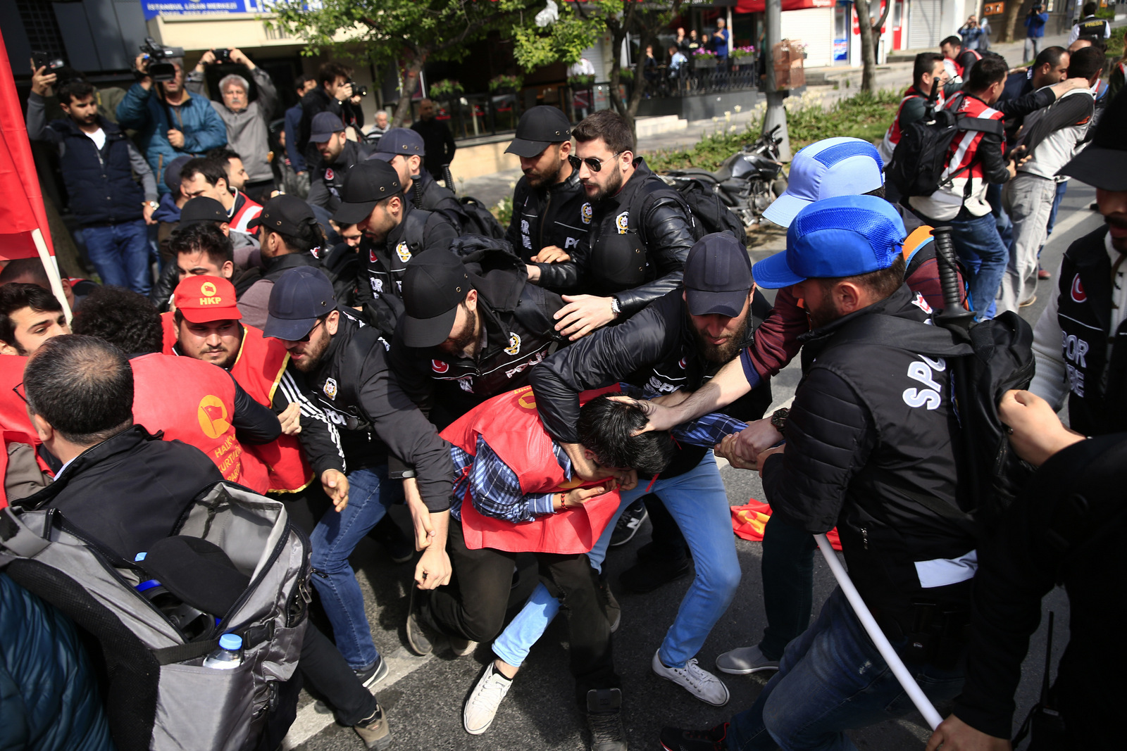 Police arrest demonstrators as they march during May Day, in Istanbul, Monday, May 1, 2017. Security forces prevented leftist groups trying to reach city's iconic Taksim Square to celebrate May Day.