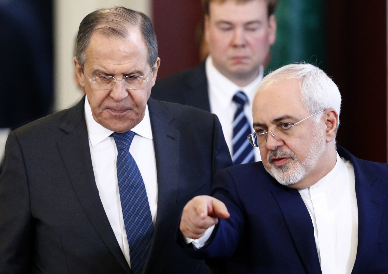 Russian Foreign Minister Sergei Lavrov, left, and Iranian Foreign Minister Mohammad Javad Zarif arrive for a joint news conference with Russian President Vladimir Putin and Iranian President Hassan Rouhani at the Kremlin in Moscow, Russia, March 28, 2017. (Sergei Karpukhin/AP)