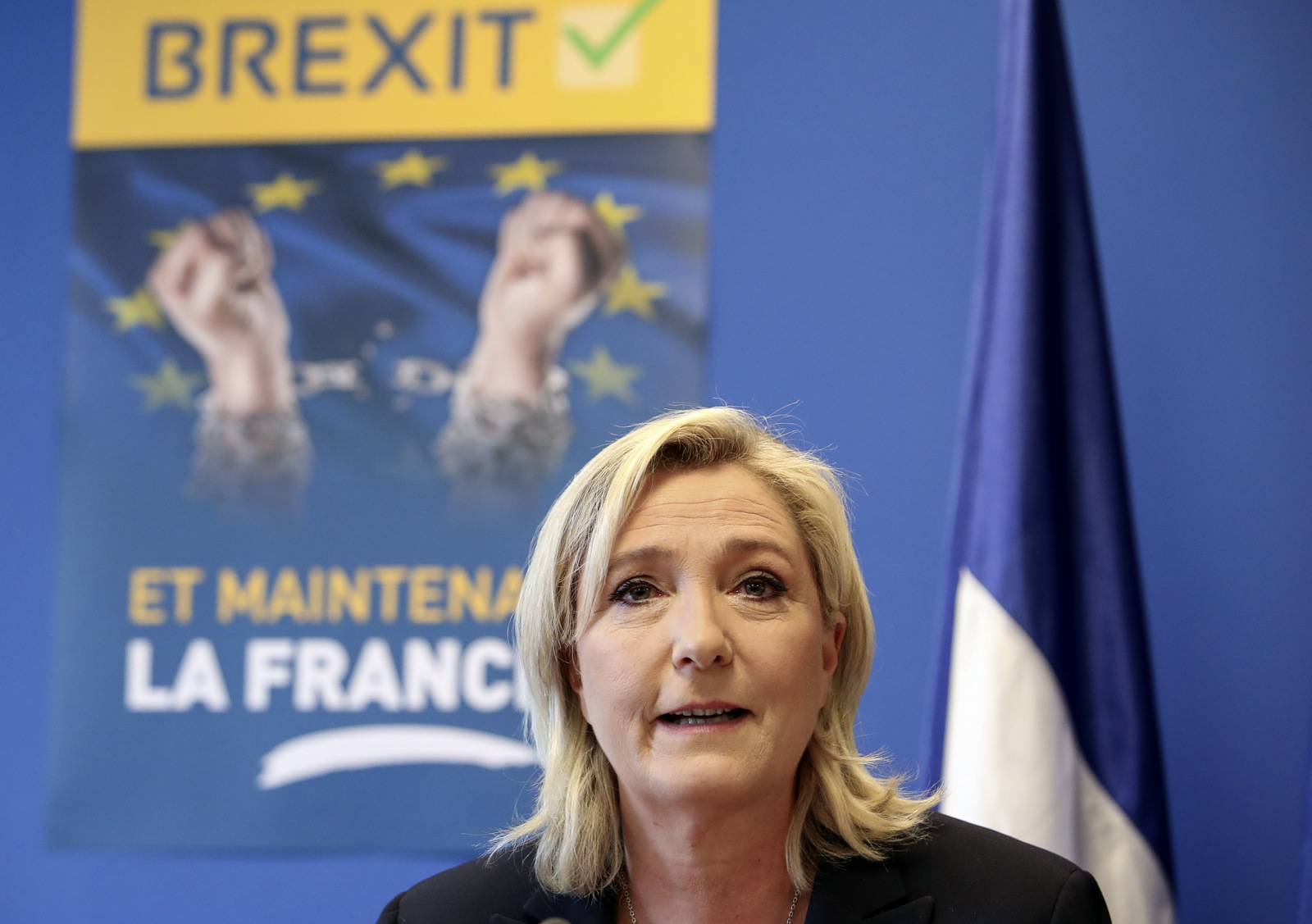 French far-right leader Marine Le Pen speaks during a press conference at the National Front party headquarters in Nanterre, outside Paris, Friday, June 24, 2016. (AP/Kamil Zihnioglu)