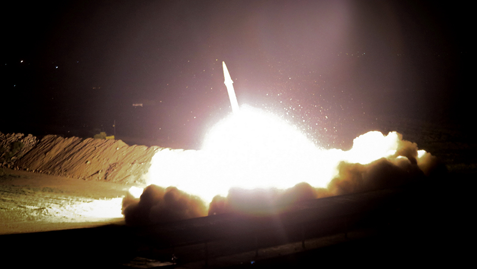 Iran's powerful Revolutionary Guard said it launched six Zolfaghar ballistic missiles from the western provinces of Kermanshah and Kurdistan. (Morteza Fakhrinejad/IRIB)