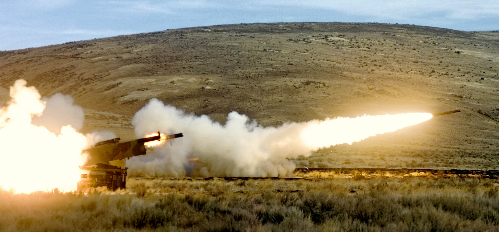 Members of the 17th Fires Brigade from Ft. Lewis fire two High Mobility Artillery Rocket System (HIMARS) rockets simultaneously in a training exercise at Yakima Training Center Nov. 1, 2007 in Yakima, Wash. (The News Tribune/Peter Haley)