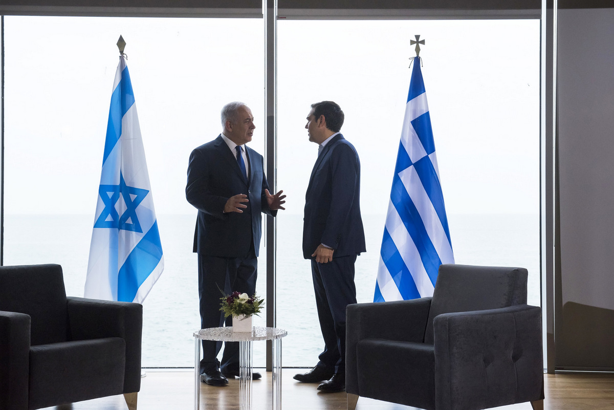 Israeli Prime Minister Benjamin Netanyahu, left, talks with Greek Prime Minister Alexis Tsipras during their meeting in Thessaloniki, Greece's second largest city on Thursday, June 15, 2017. Under heavy security Netanyahu is in northern Greece to discuss plans to become a key supplier of European energy through an ambitious Mediterranean undersea natural gas pipeline project. (AP/Giannis Papanikos)