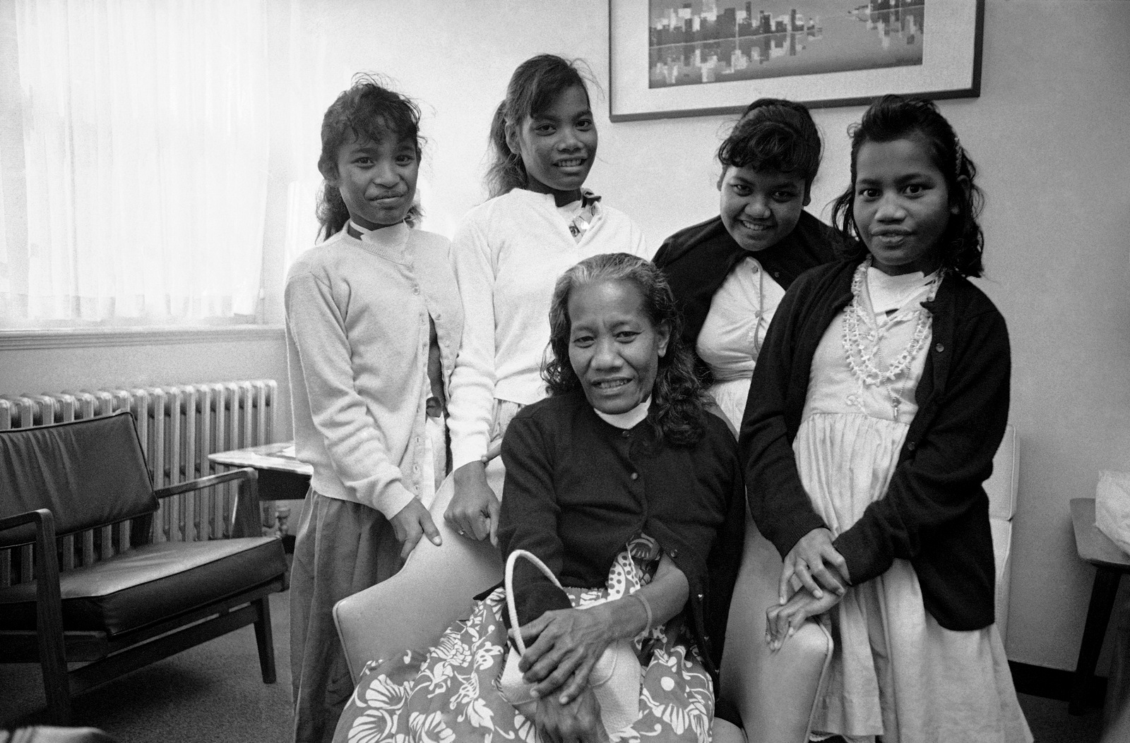 From left to right, Jonita Jalme, 15, Jemloch Kebinli, 14, Lisa Paul, 42, Mary Kebinli, 20, and Mina Boaz, 13, exposed to heavy radio-active fallout in 1954, pose before leaving New England Deaconess Hospital in Boston on June 11, 1966, where they recovered from surgery for removal of growths from their thyroid glands. The group were among the 64 residents of Rongelap atoll in the Marshall Islands who were showered with particles from an H-bomb test on March 1, 1954 (AP/FCC)