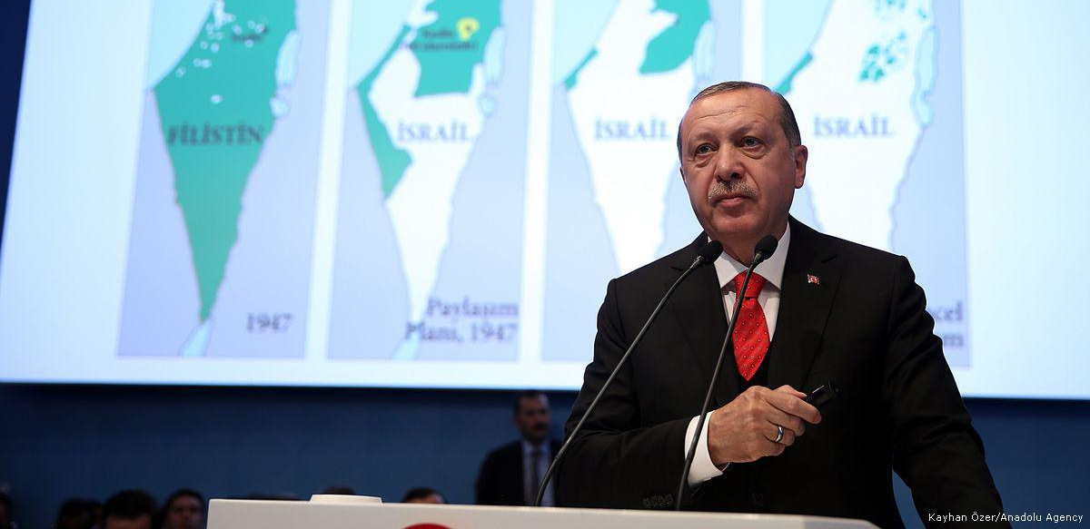 Turkish President Recep Tayyip Erdogan makes an opening speech of the extraordinary summit of the Organisation of Islamic Cooperation (OIC) at the Lutfi Kirdar International Convention and Exhibition Center in Istanbul, Turkey on December 13, 2017 (Kayhan Özer/Anadolu Agency)