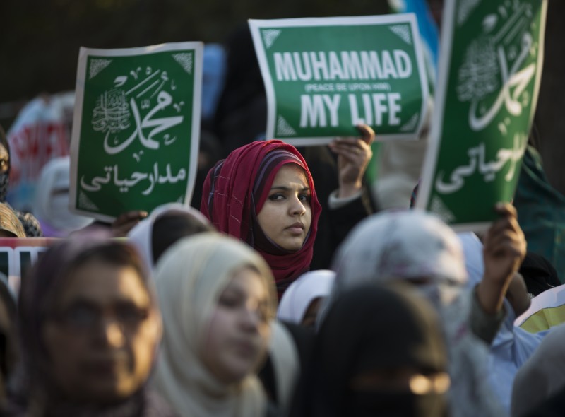 Supporters of the Pakistani religious political party Jamaat-e-Islami attend a rally to condemn the French satirical weekly magazine Charlie Hebdo for publication of caricatures of the Prophet Muhammad, in Islamabad, Pakistan, Friday, Jan. 30, 2015. (AP Photo/B.K. Bangash)