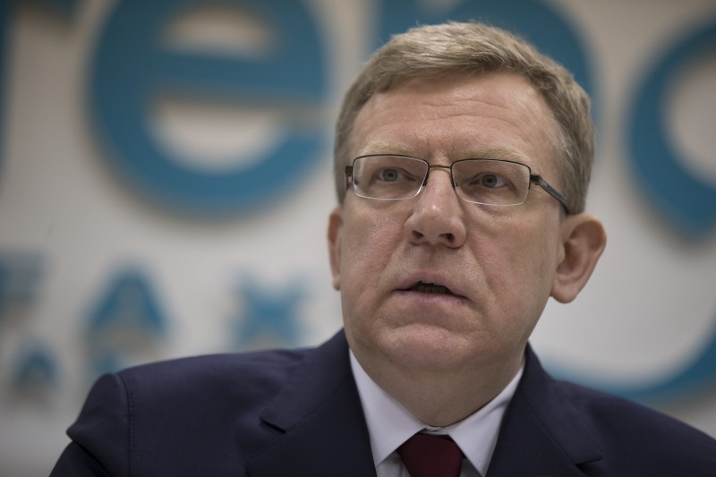 Kudrin, wearing a suit, has a worried expression on his face.