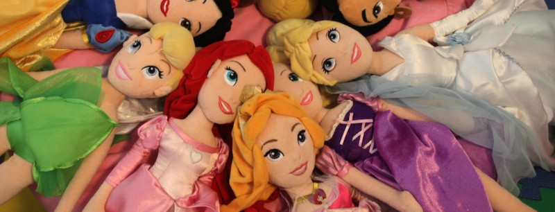 An array of Disney Princess dolls based on different films. Americans learn easy consumerism from a young age, but rarely consider the origins of consumer goods. (Genevieve Tran)