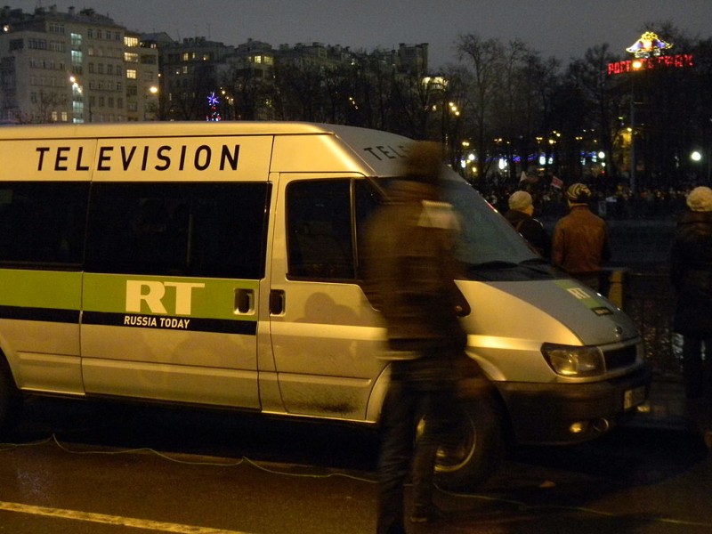 A Russia Today (RT) News van parked near protests on Bolotnaya square in Moscow. (Wikimedia / FeelSunny)