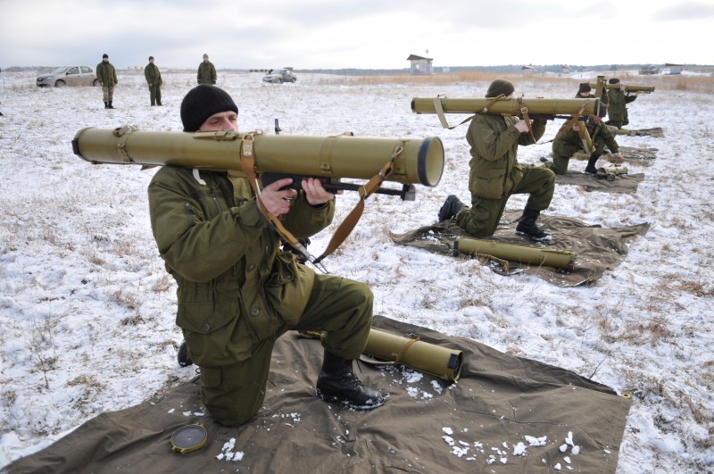 Ukrainian army soldiers perform a weapons exercise at a training ground outside Lviv, western Ukraine, Thursday, Feb. 5, 2015. The Ukrainian government is anxious to use Thursday's visit by U.S. Secretary of State John Kerry to Kiev to reiterate its plea for lethal aid. President Barack Obama has opposed the idea of sending weapons to Ukraine but sources in his administration say this position could change in the light of recent events. (AP Photo/Pavlo Palamarchuk)