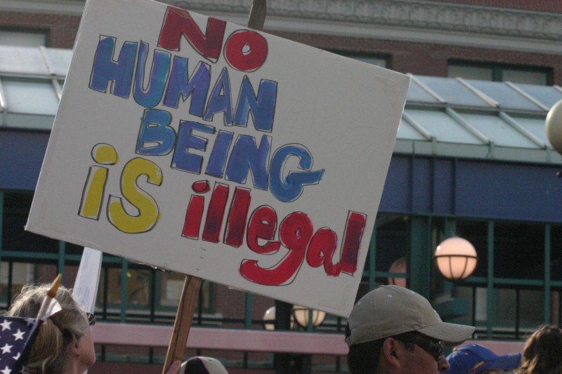 File: A protest sign at an immigration reform rally in Seattle reads "No Human Being Is Illegal," photographed on April 10, 2006. (Photo: Flickr / Scarlet_Fyre)