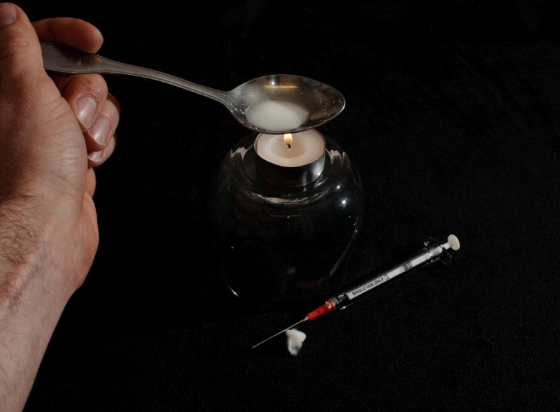 A photographer's depiction of the process of injecting heroin, including a spoon with the drug, and a syringe at the ready. Will homebrew heroin end the dangerous demand for illegally imported Mexican heroin? (Flickr / Chris Gehlen)