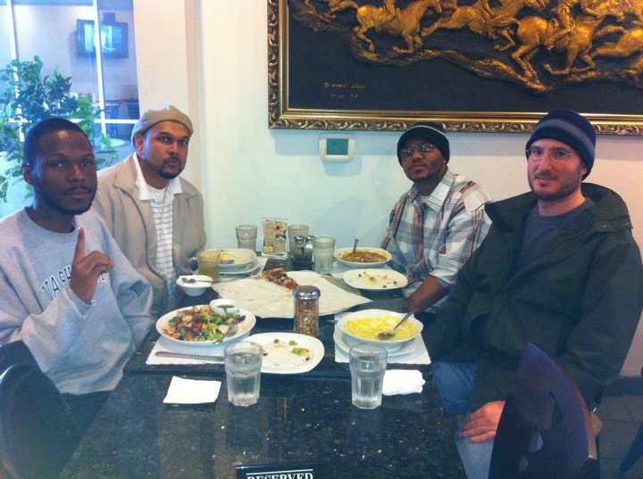 Sharing a meal with Malcolm Shabazz. (Professor ALI)