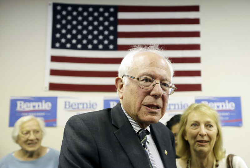 Democratic presidential candidate Sen. Bernie Sanders speaks with supporters during an open house at his Iowa campaign headquarters, Saturday, June 13, 2015, in Des Moines, Iowa. (AP Photo/Charlie Neibergall)